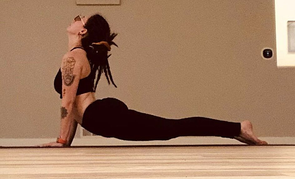Yogamaya student in upward dog pose